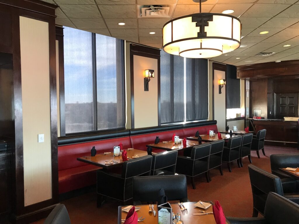 BLACK ROLLER SHADES IN RESTURANT